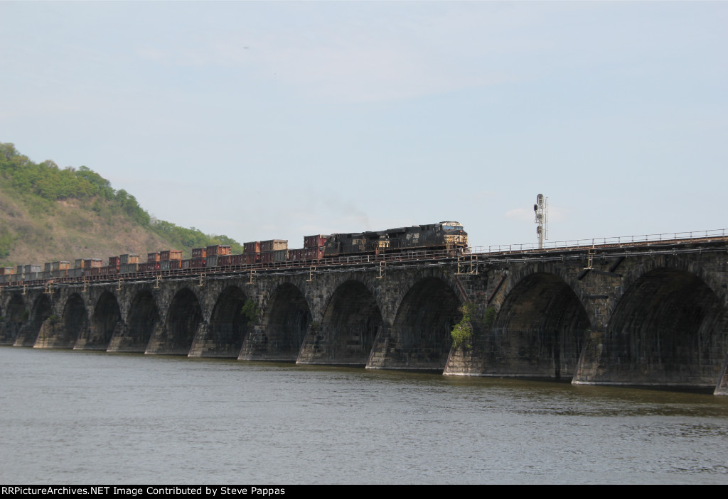 NS 7671 and 9837 take a manifest freight over Rockville Bridge